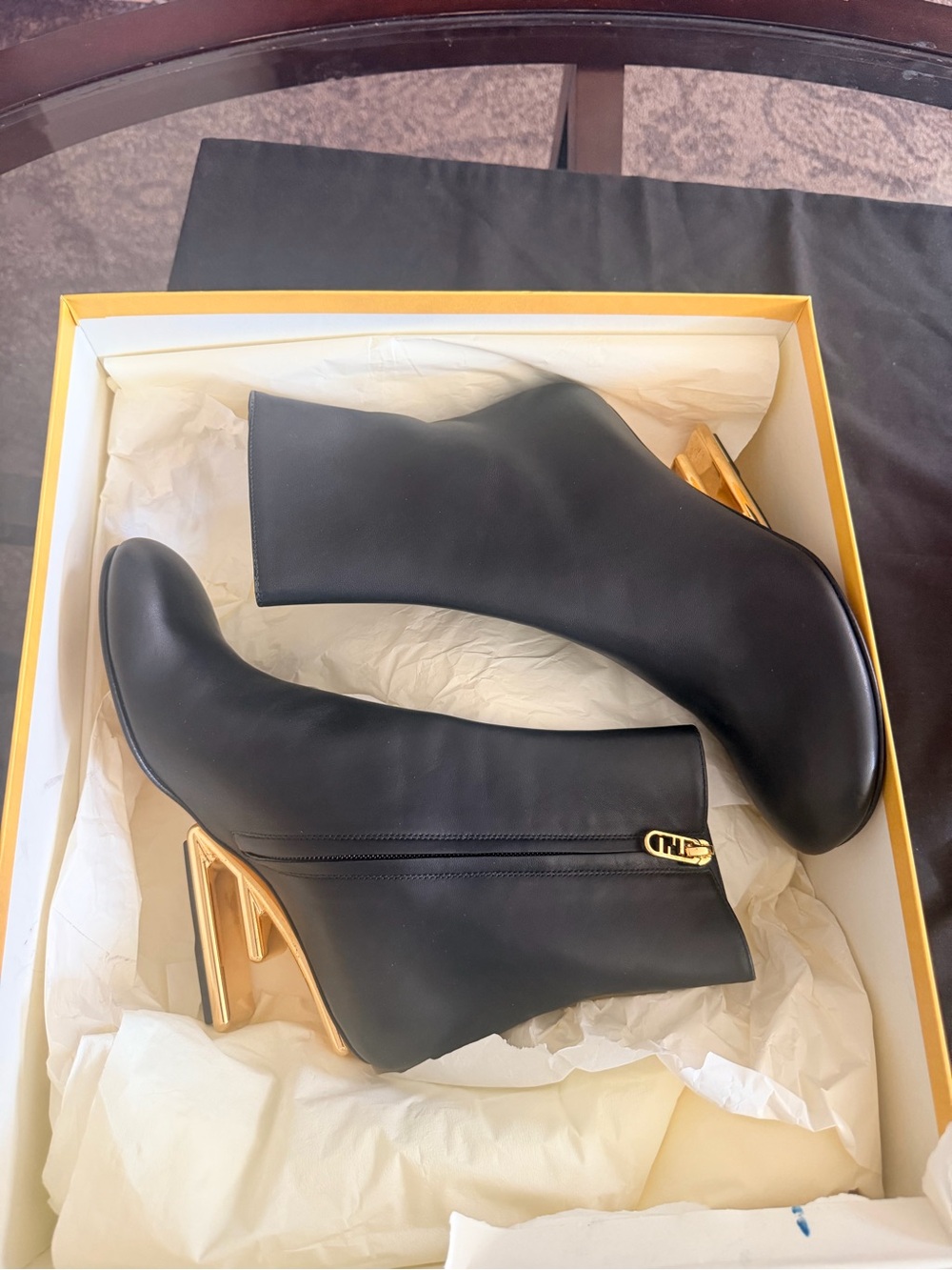 Fendi First Bootie Nappa Boots
Yellow Box with Black Logo